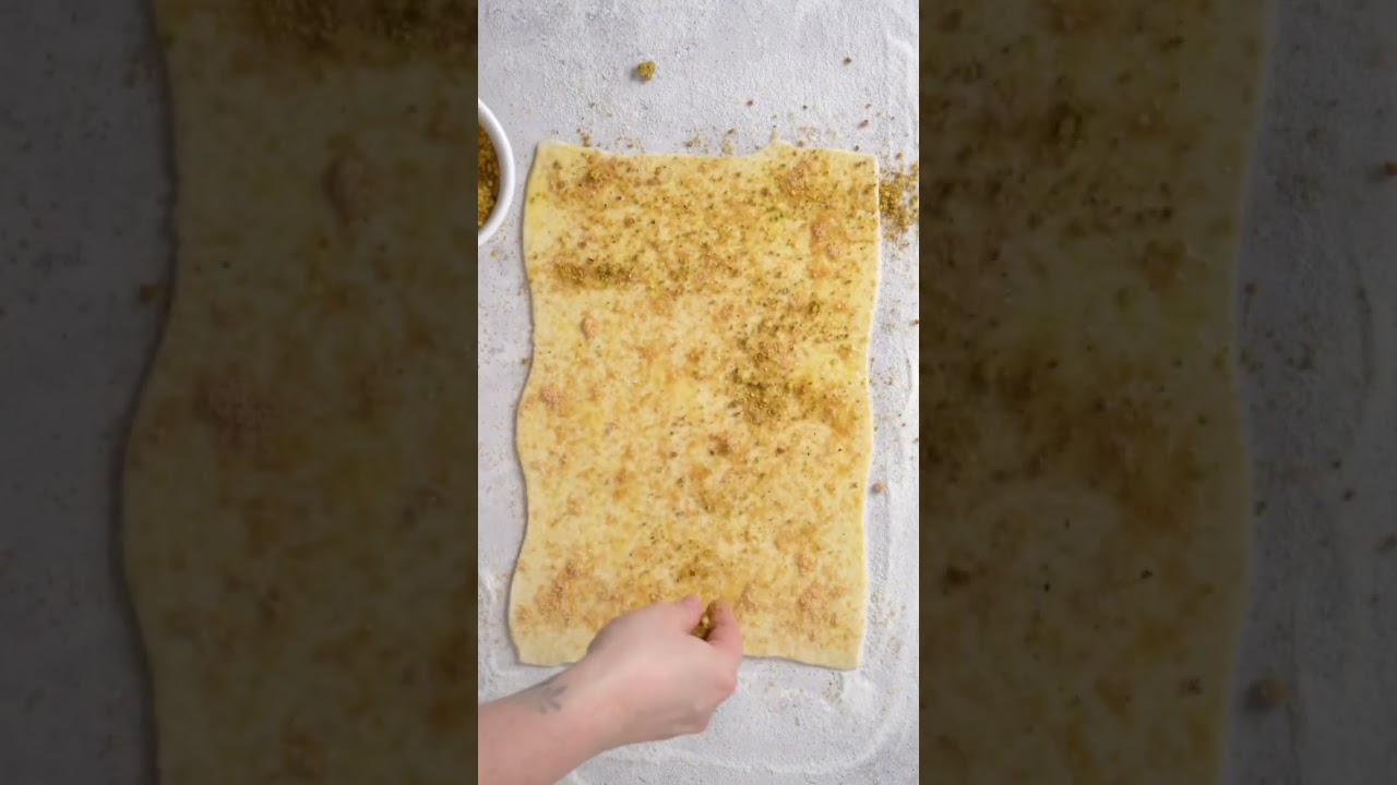 Sweet, buttery crispy cookies filled with a pistachio filling. #recipe #purim