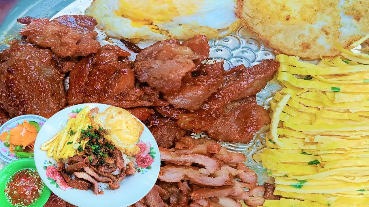 Cambodian breakfast, fried pork with rice recipe, rice with pork and eggs.